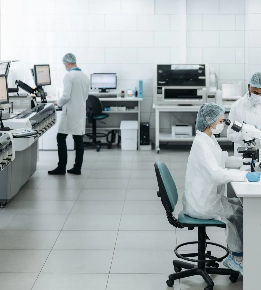 Researchers running experiments in a lab